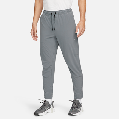 Nike Unlimited Men's Dri-FIT Zippered Cuff Versatile Pants. Nike.com